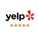 Yelp logo with five-star rating for Pure Dentistry dental practice review.