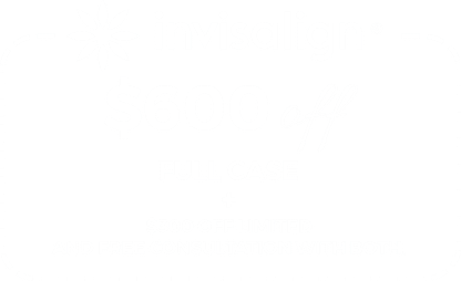 Smiling woman in dental chair receiving professional teeth cleaning from dentist during routine checkup.